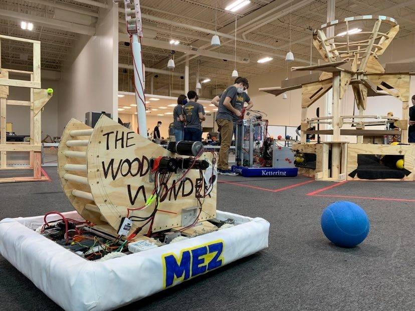 The Wooden Wonder, one of the robots brought by a MEZ team, sits on the field waiting for the next match.